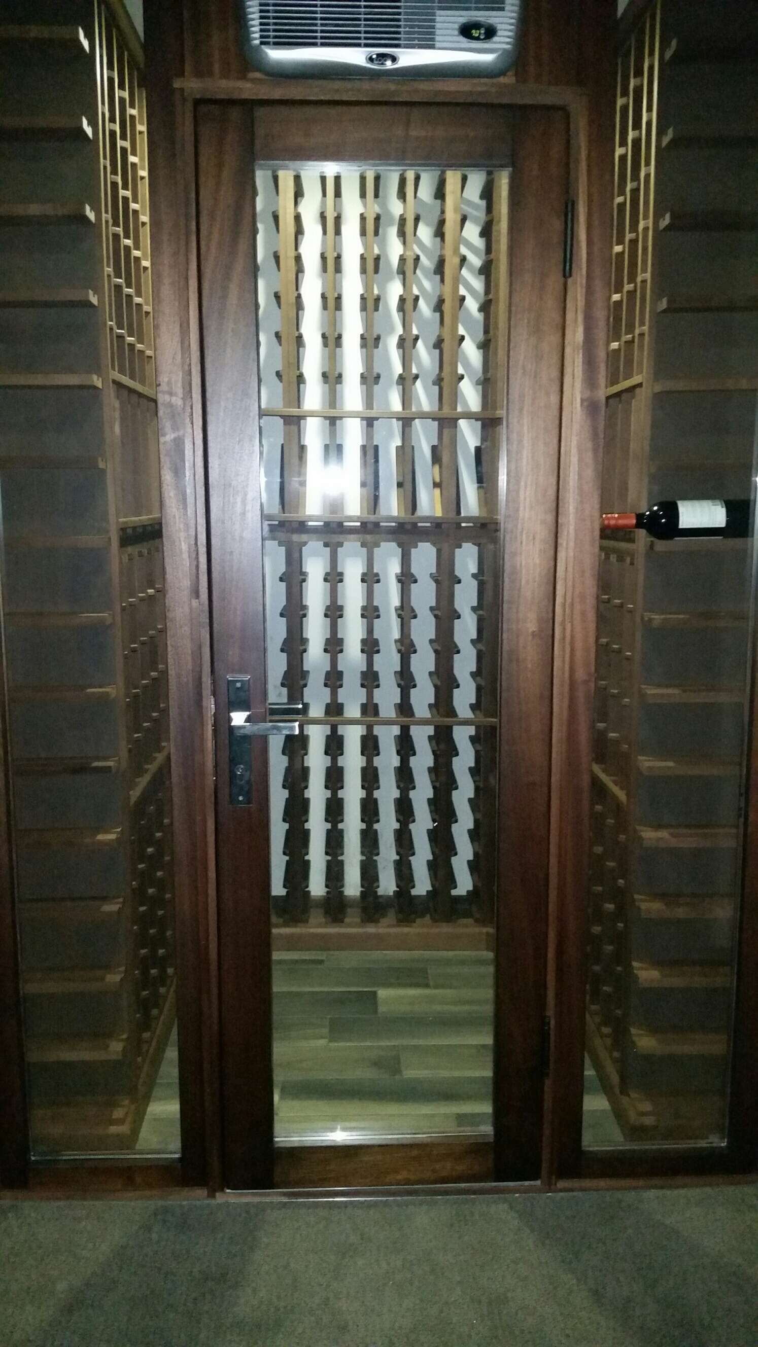 Featuring VWC custom wine racking, with matching door unit and sidelights.